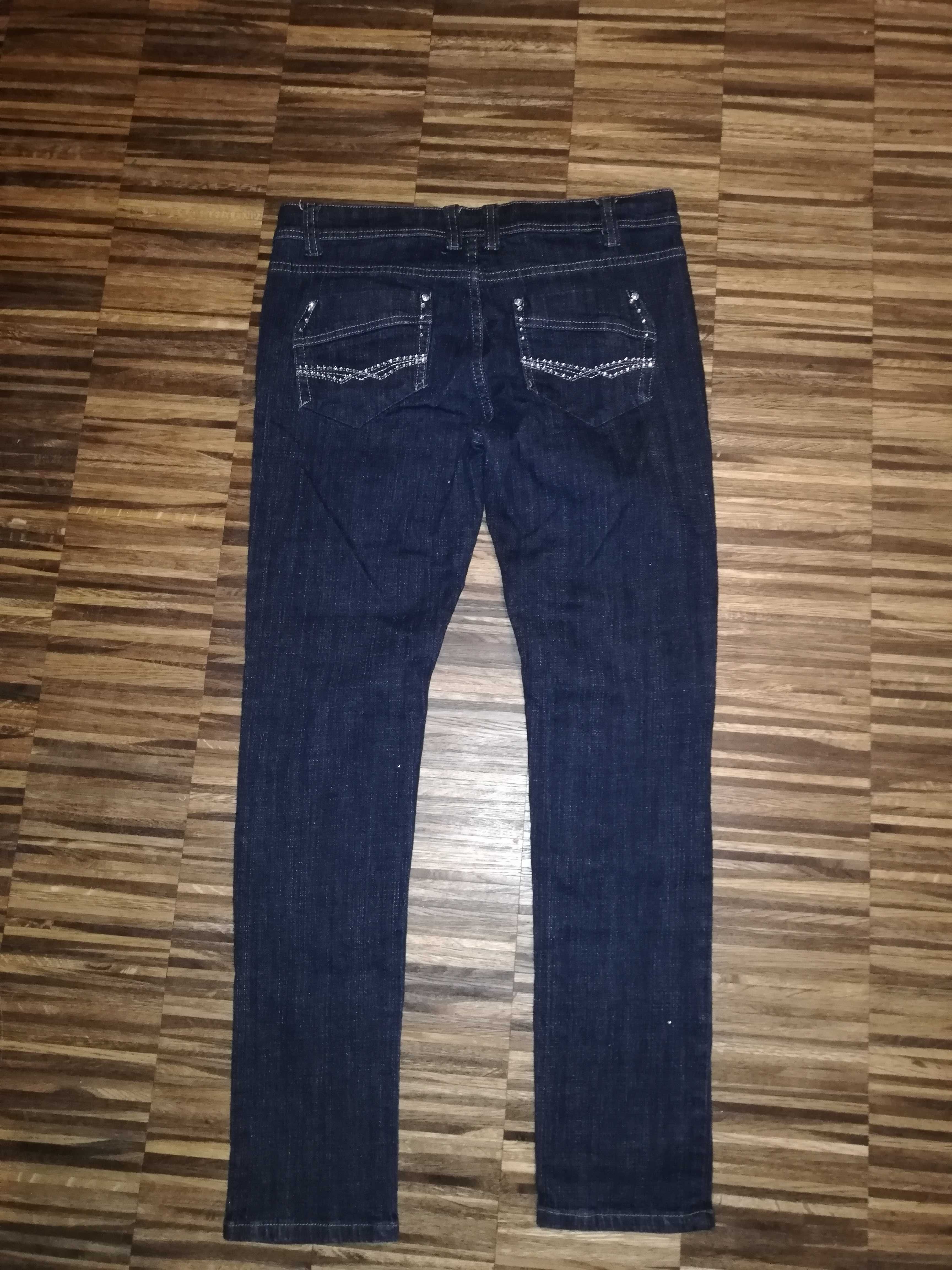 Damskie spodnie jeans rozm. 38/40