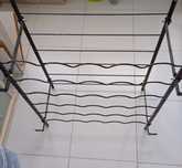 Porta garrafas em metal