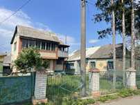 Будинок + будинок з ділянкою 35 соток. Володарка