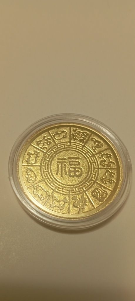 Монета дванадцять животних, символи року.