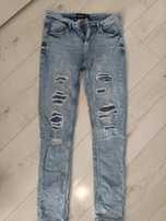 Spodnie jeans przecierane