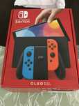 Nintendo Switch Oled Full Zestaw+trzymak Stan perfekcyjny