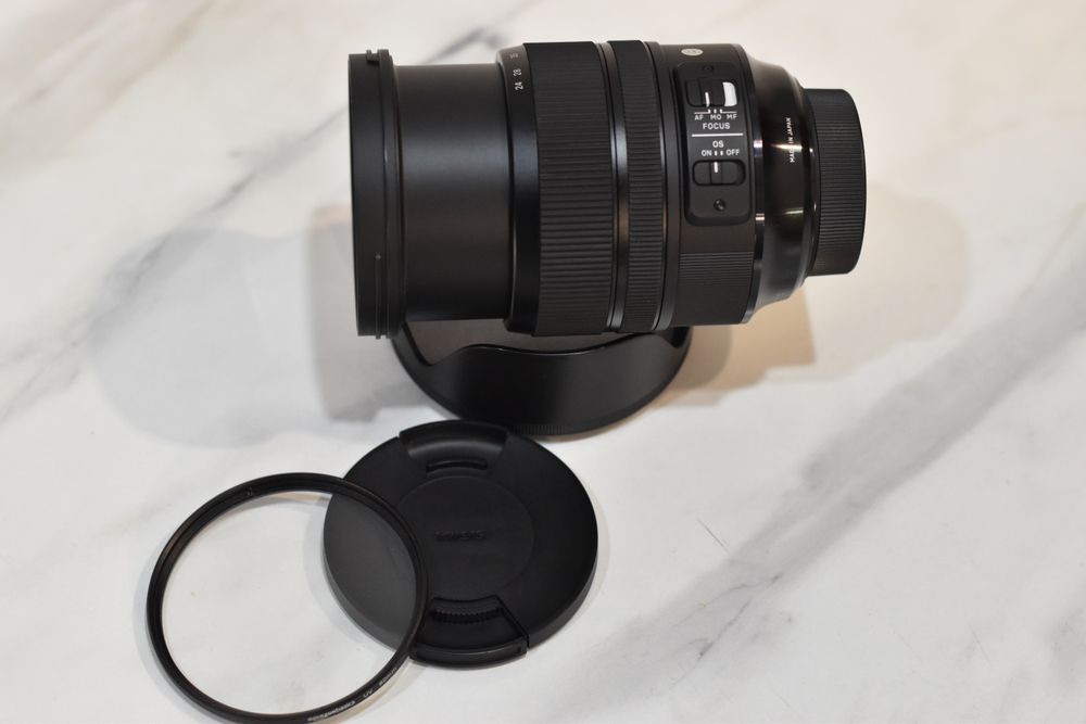 Sigma for Nikon 24-70 2.8 + Фільтр UV стан нового одна помарка