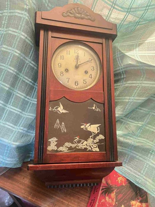 Relógio de corda cor castanha