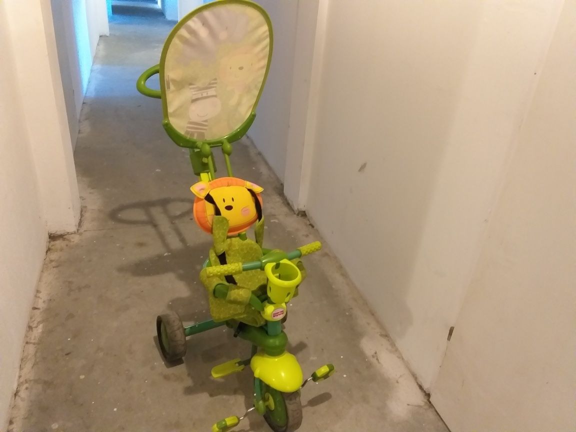 Wózek rowerek jeździk - Fisher Price zielony Lew + gratis