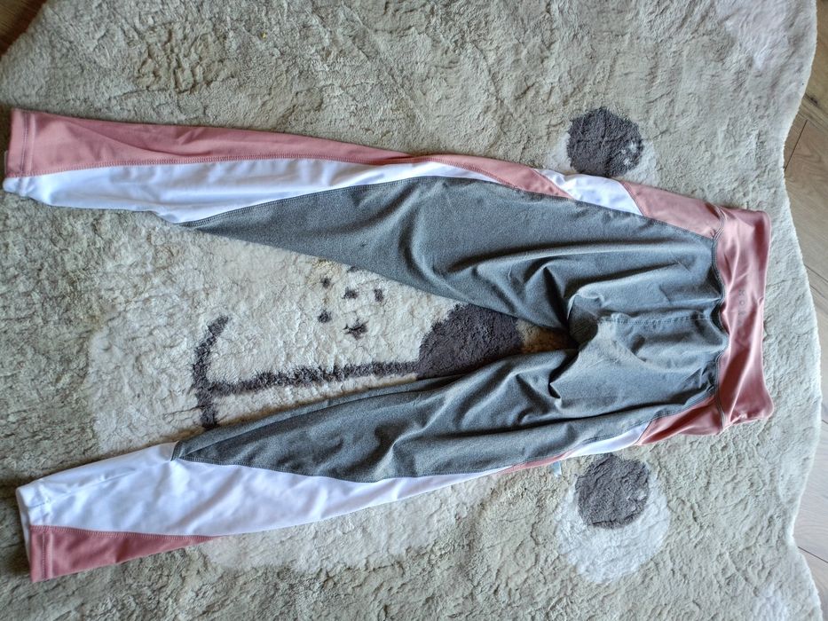 Nowe z metką Legginsy damskie sportowe długie w paski r. S/m