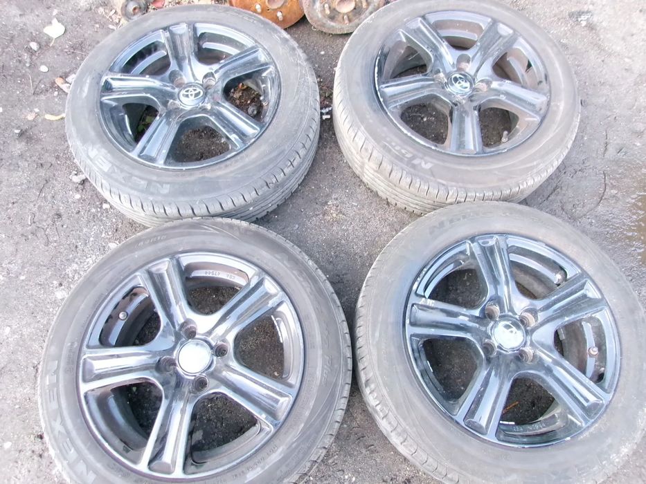KOŁA FELGI ALUMINIOWE OPONY TOYOTA YARIS 185/60/15 4x100 KOMPL  YARIS II    III