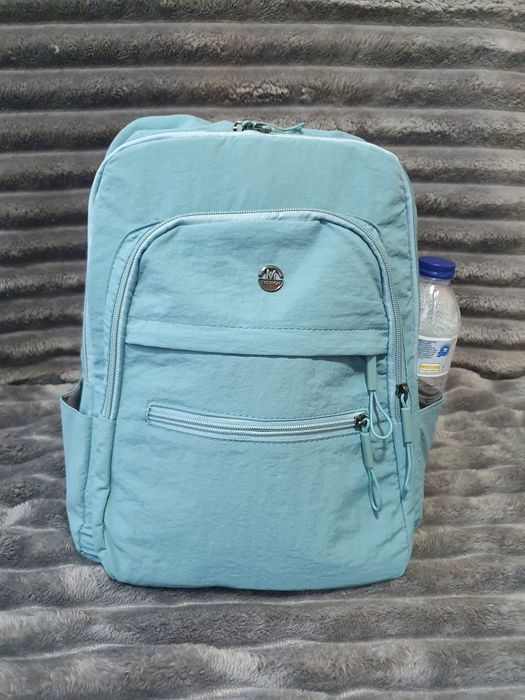 Mochila azul claro impermeável NOVA – ideal para viagem ou dia-a-dia