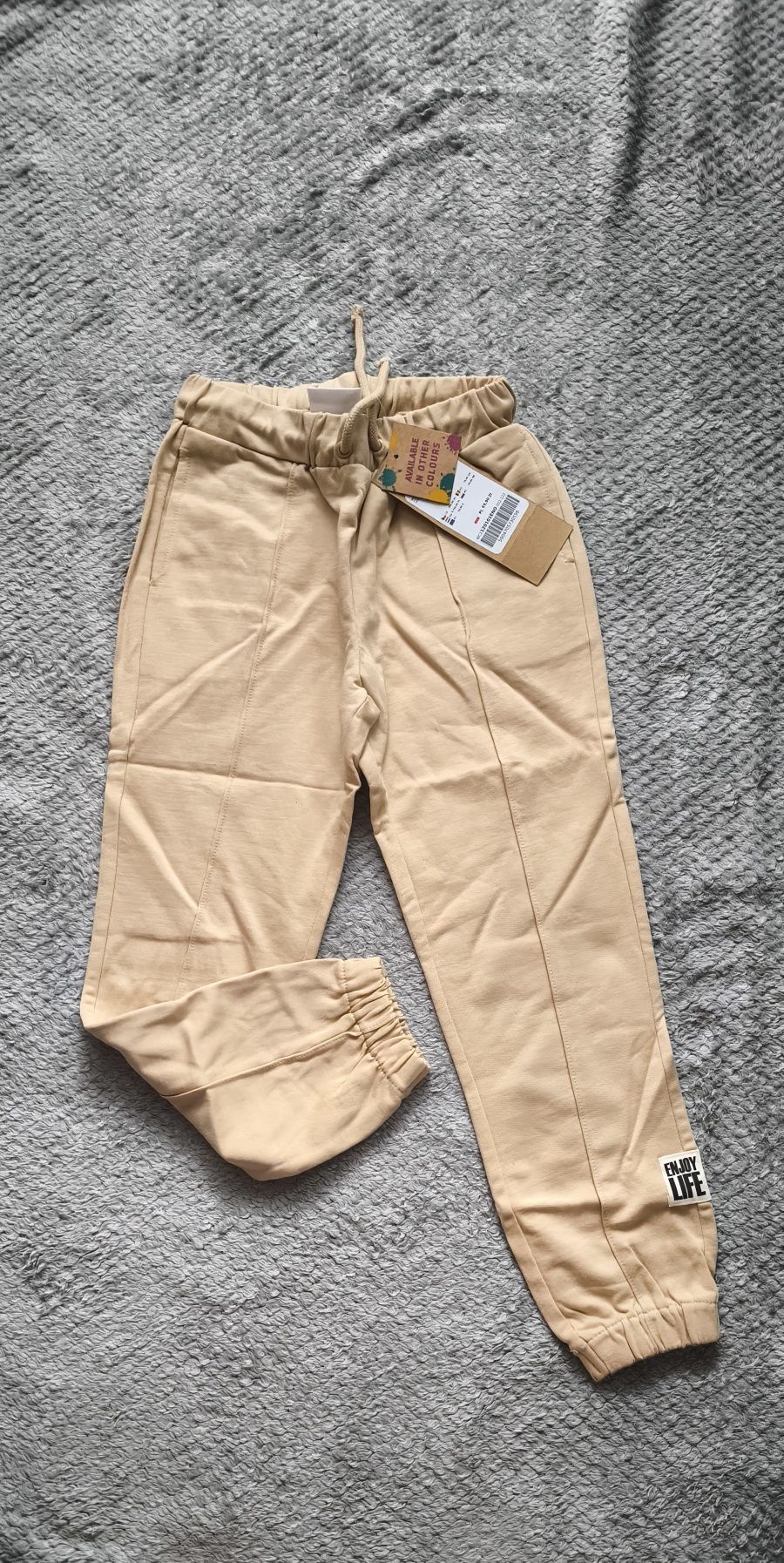 Nowe spodnie dresowe coccodrillo r. 122