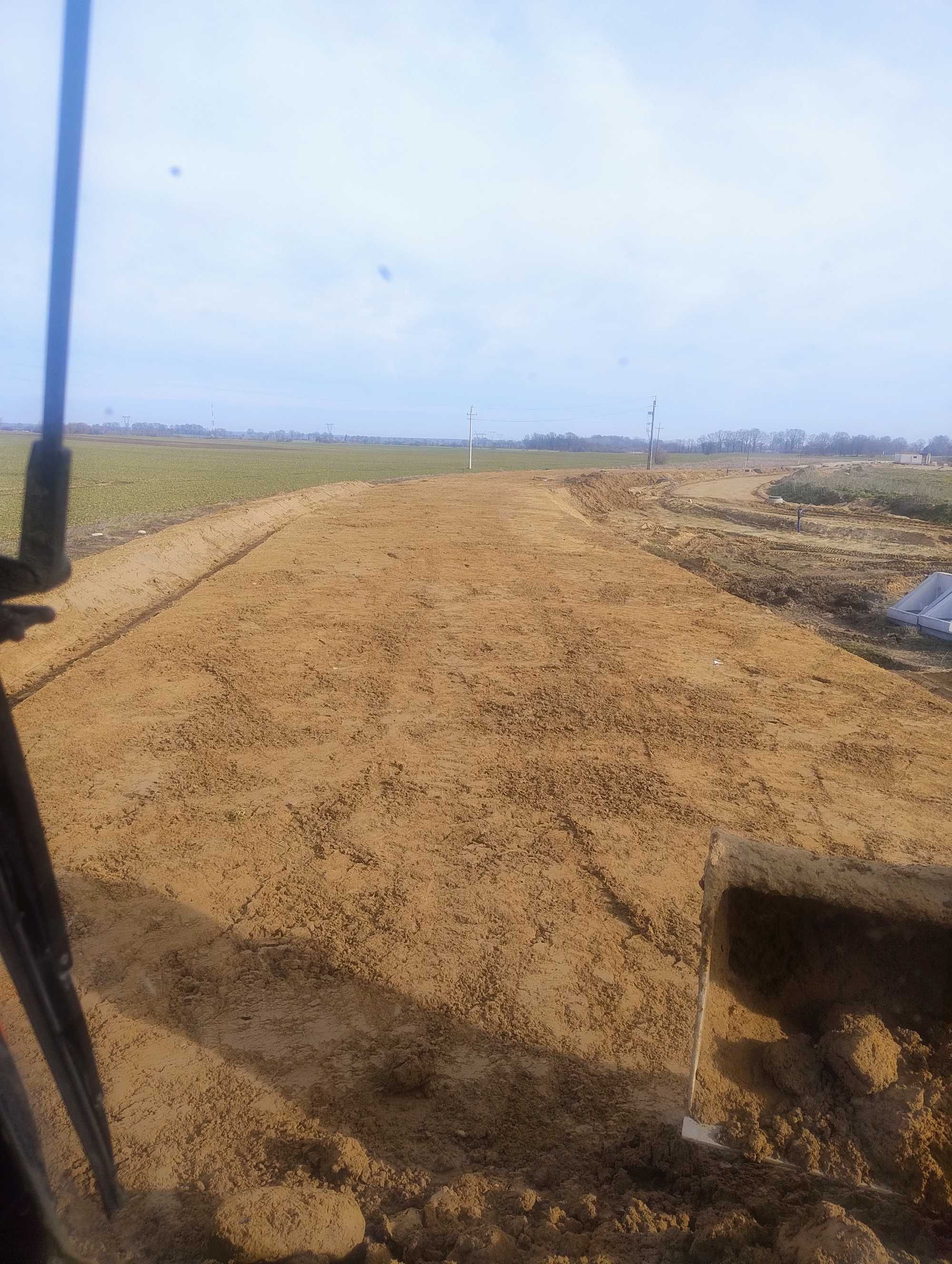 Wynajem koparki kołowej  z operatorem   z Systemem 3d , Pracę ziemne