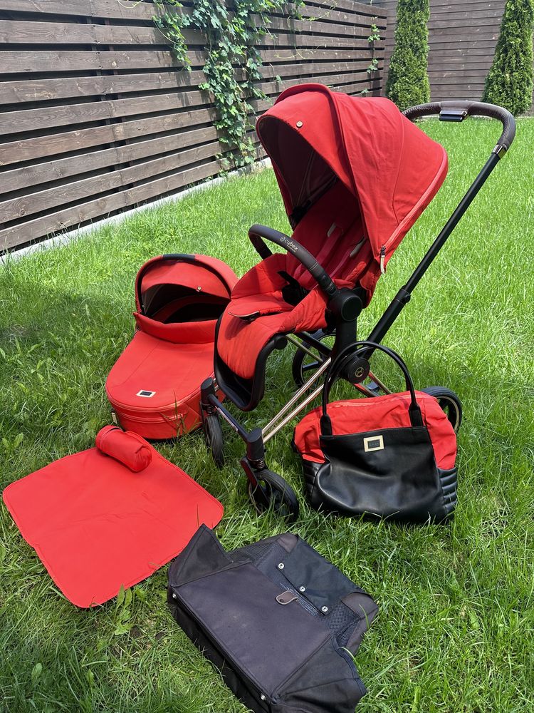 Cybex ярко оранжевая коляска