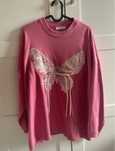 Sweter z motylem