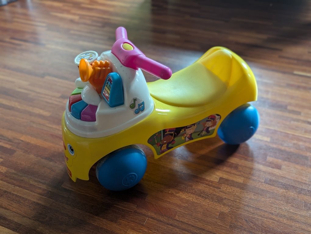 Fisher-Price Little People Jeździk Muzyk 8380