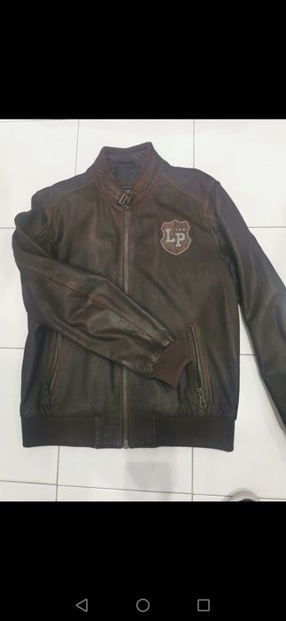 Blusão lion of porches