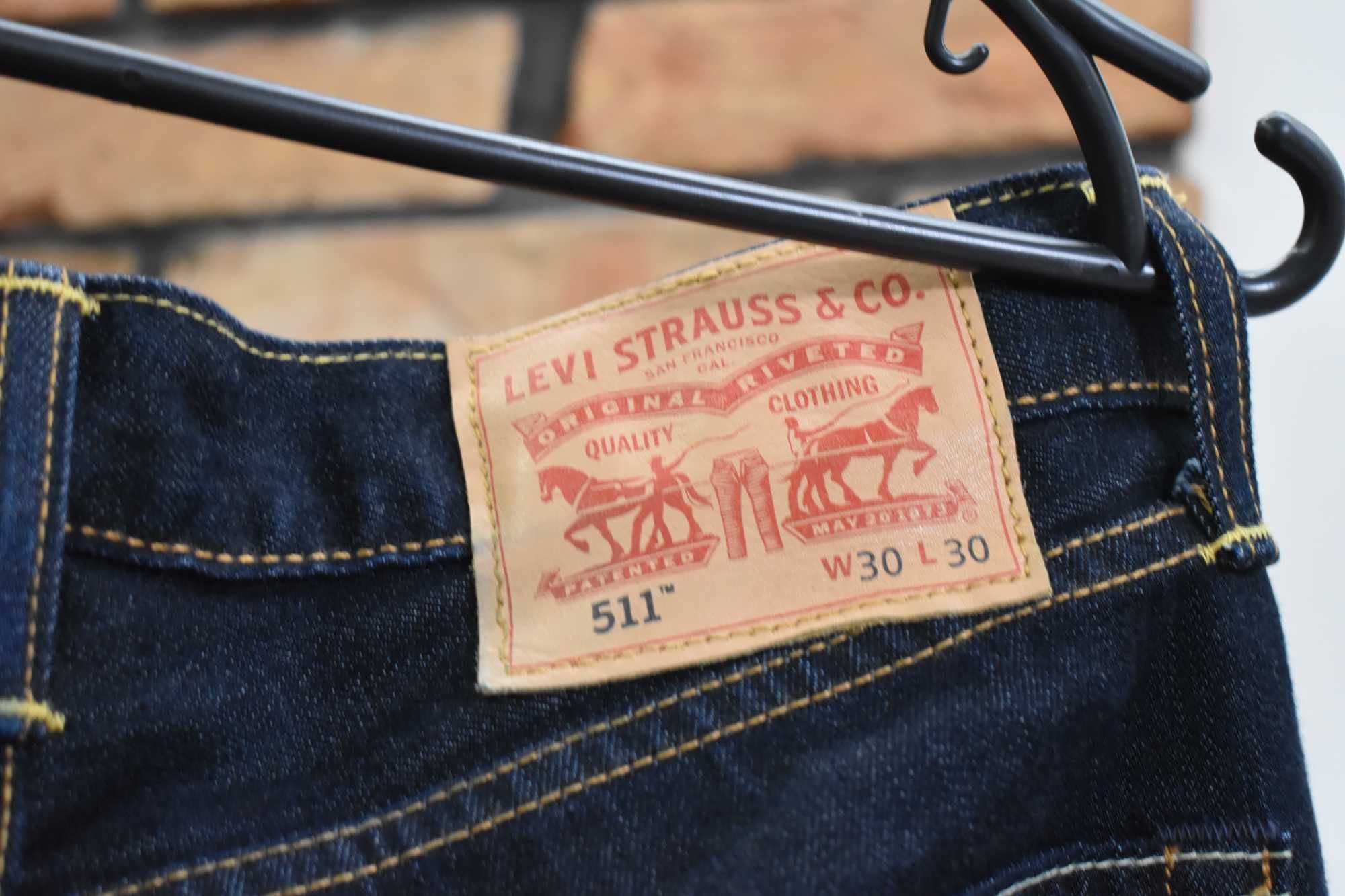 Levi's 511 granatowe spodnie jeansy oryginał jak nowe W30 L30