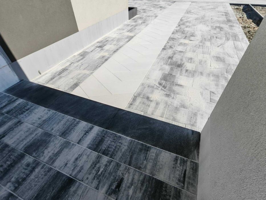 Układanie kostki brukowej i montaż ogrodzeń