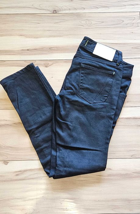 Spodnie jeansy rurki woskowane adidas M 38