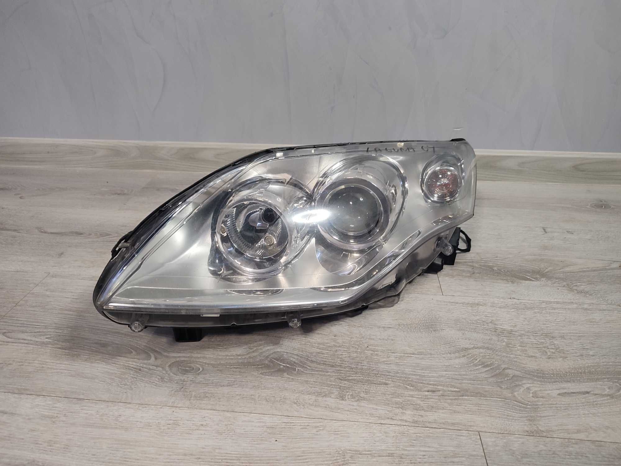 Reflektor lewy Lampa lewa Renault laguna 07 uszkodzone ucho