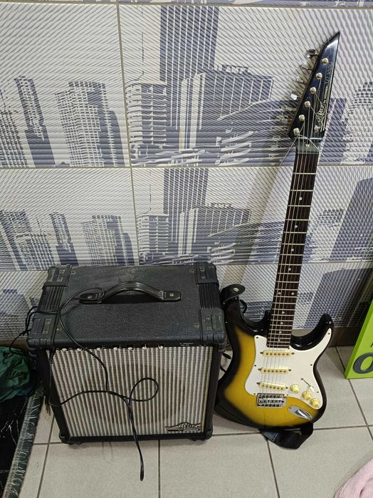 Zestaw gitara oraz wzmacniacz pięć firmy Merlin by Hohner bdb stan