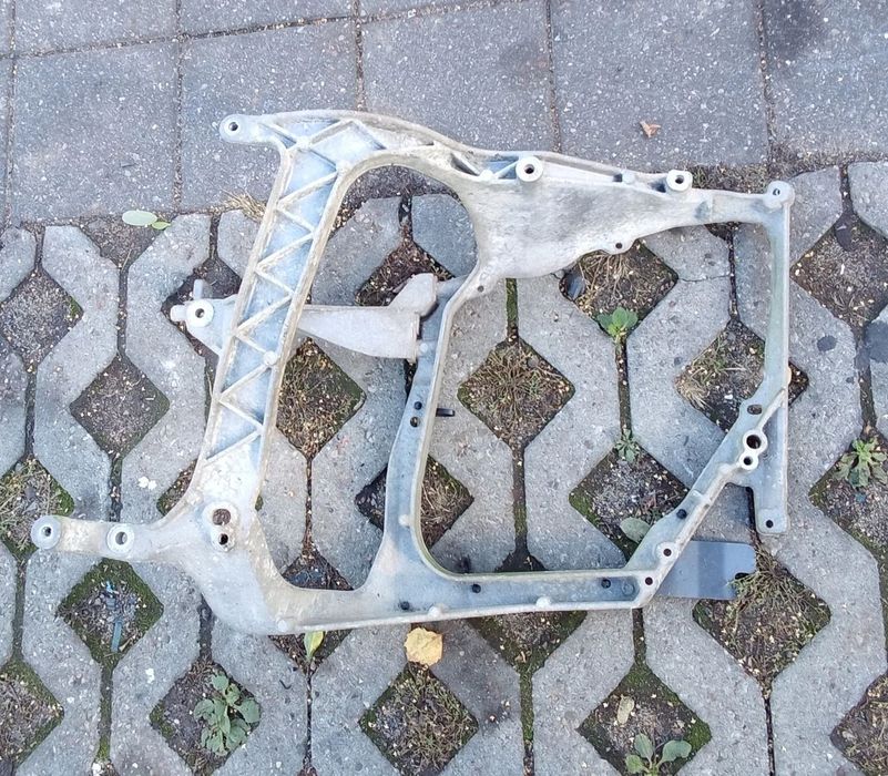 Okular wspornik mocowanie lampy DAF XF106 lewy 1798448