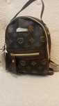 Pequena Mochilas Castanha 5€