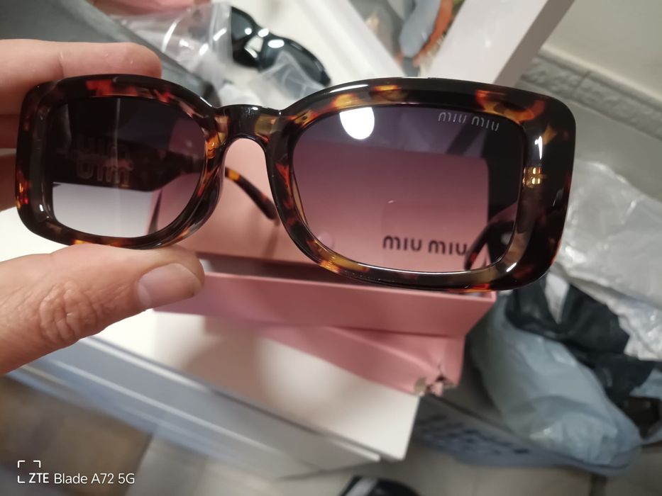 Oculos miumiu novos
