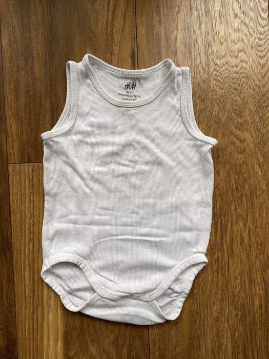 Prążkowane body H&M rozm. 68