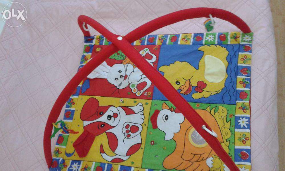 Развивающий коврик .