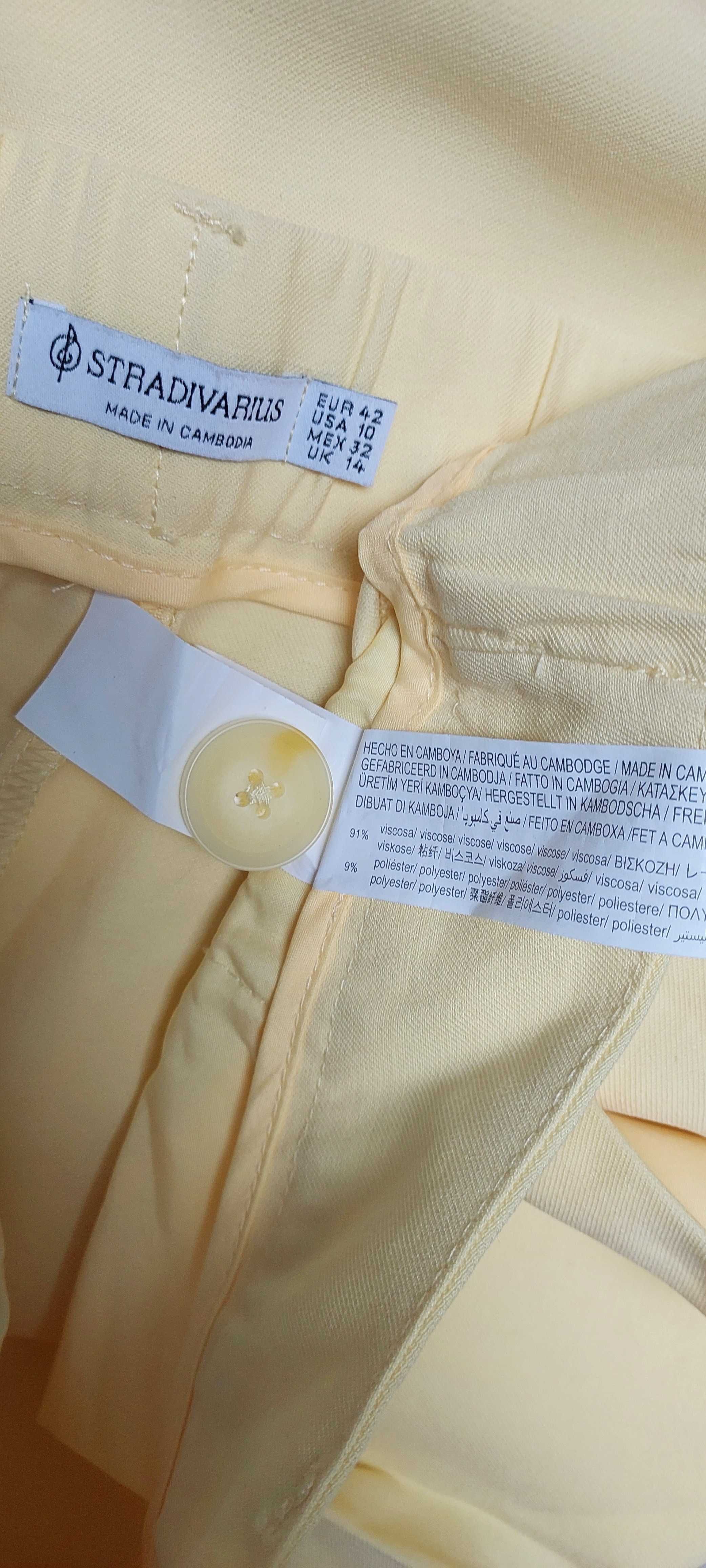 Żółte spodnie z wiskozy STRADIVARIUS, R. XL