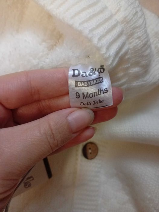 Новий комбінезон 9м