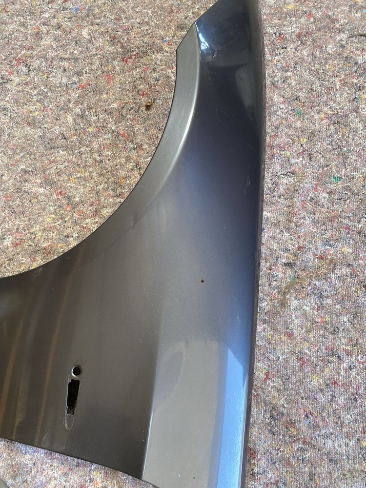 Blotnik lewy przod przedni bmw e90 e91