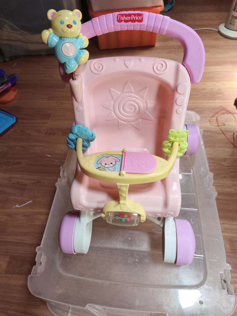 Carrinho de bebê de brincar