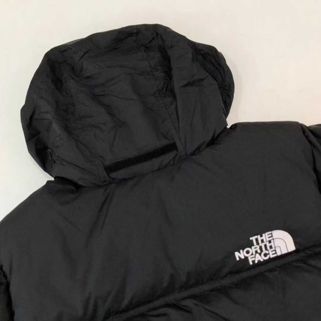 Stylowe puchowe kurtki The North Face dla par. rozmiar: L