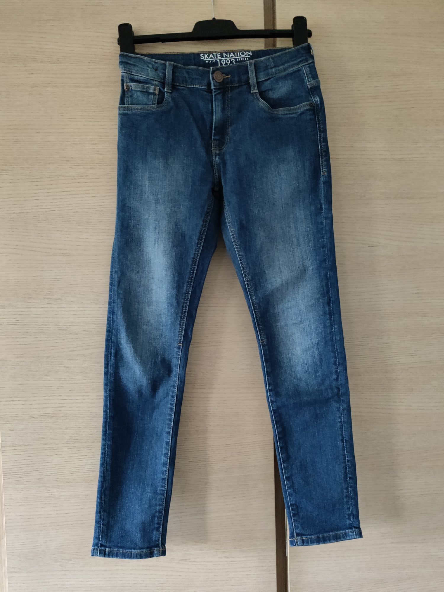 Niebieskie jeansy C&A r.152