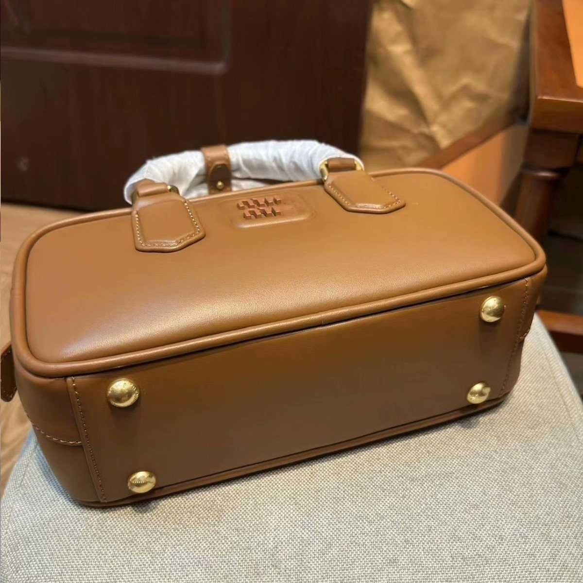 Miu Miu Brązowa Torebka - Klasyk Elegancji w Każdej Stylizacji