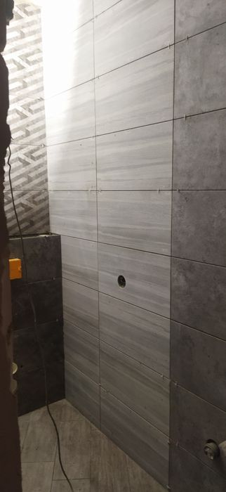Укладка керамічної плитки,ламінат,шпаклівка стін .
