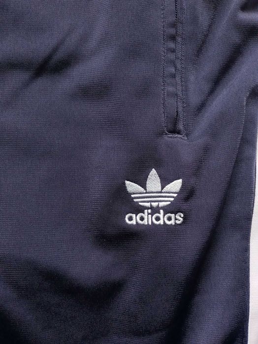 Damskie spodnie dresowe Adidas Adicolor Classics Firebird Primeblue