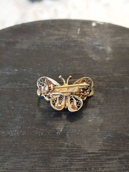 Продам брошь серебряная с позолотой