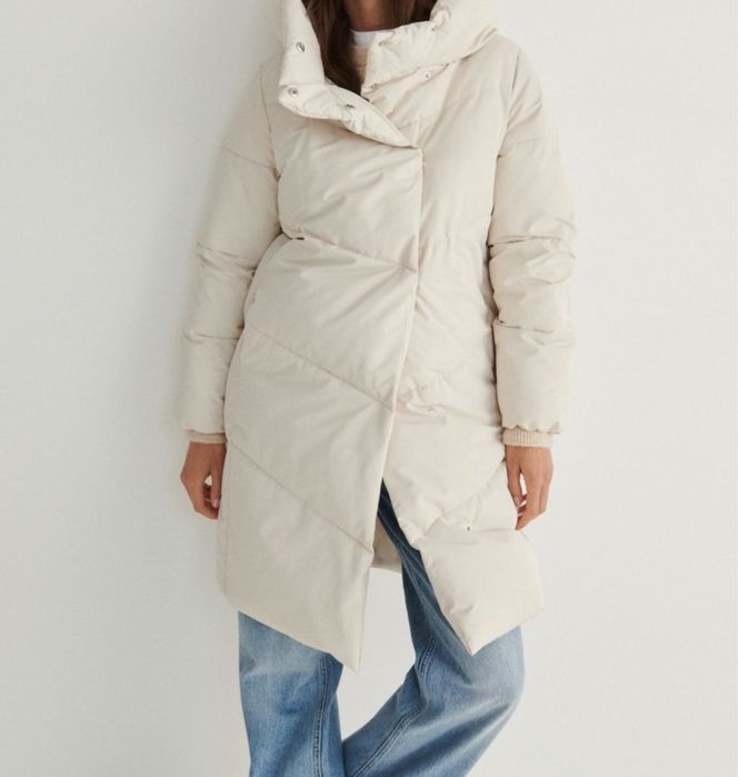 Бежевий пуховик xs-s