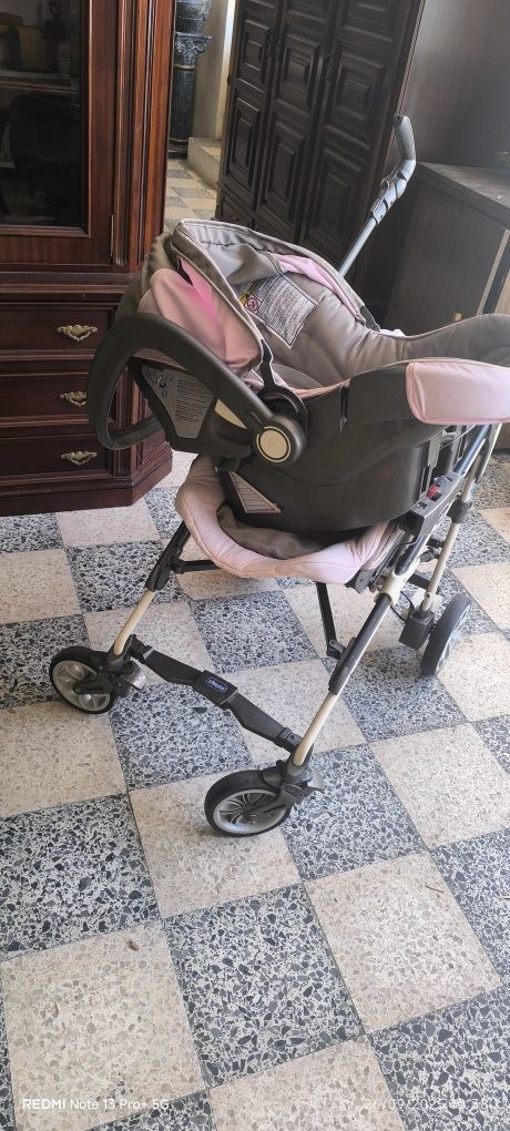 Carrinho de bebé rosa , cinza e bege