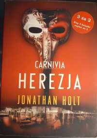 Carnivia Herezja, Jonathan Holt