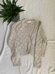 Beżowy sweter ażurowy