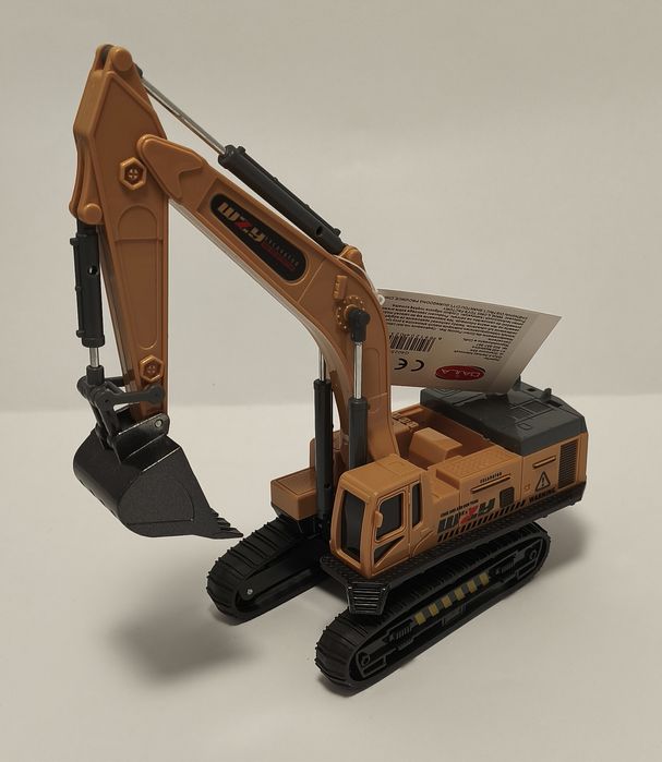 Koparka metalowa z gumowymi gąsienicami