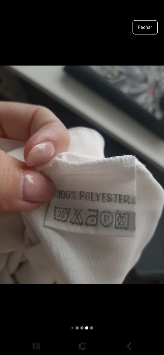 Camisa branca com pormenores