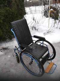 Инвалидное кресло.