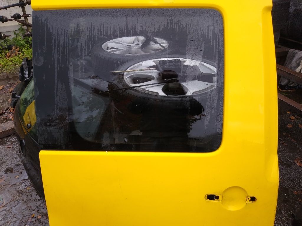Drzwi prawe przesuwne VW caddy III szyba