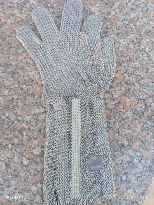 Luvas de malha de aço