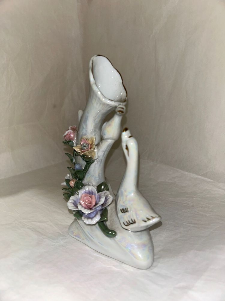 Estatueta em porcelana