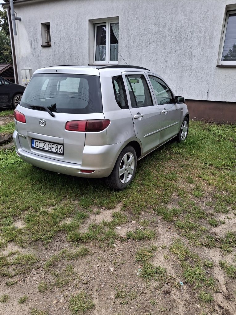 Sprzedam mazdę klima ,alu sprawne