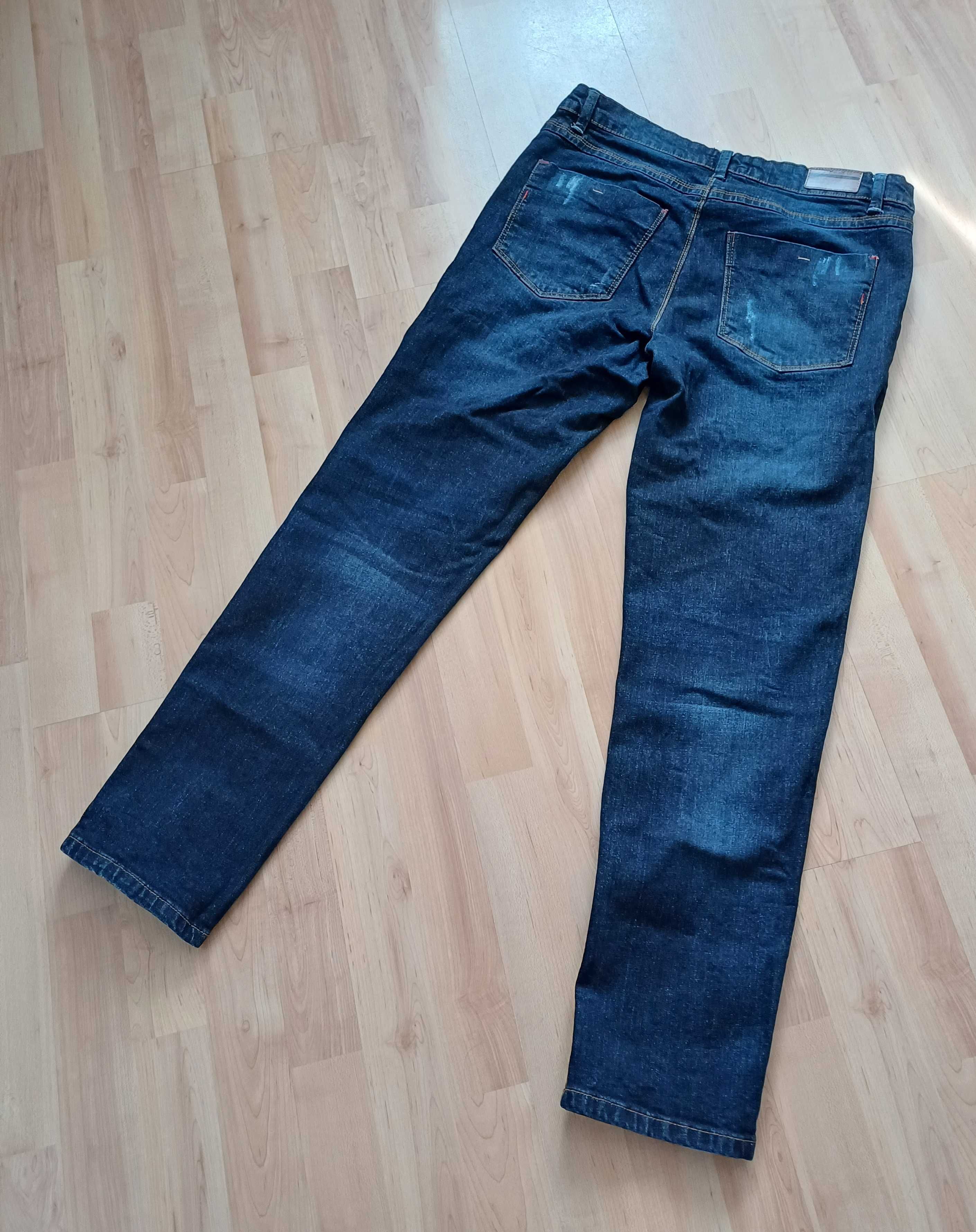 Spodnie długie jeans męskie granatowe wycierane Carry 40/L bawełna